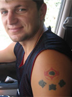 Одна из первых татуировок российского киокушина на плече Эдуарда Губерштро.